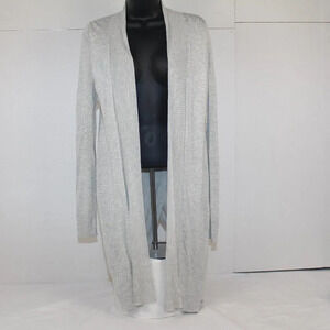 Neiman Marcus Shrug